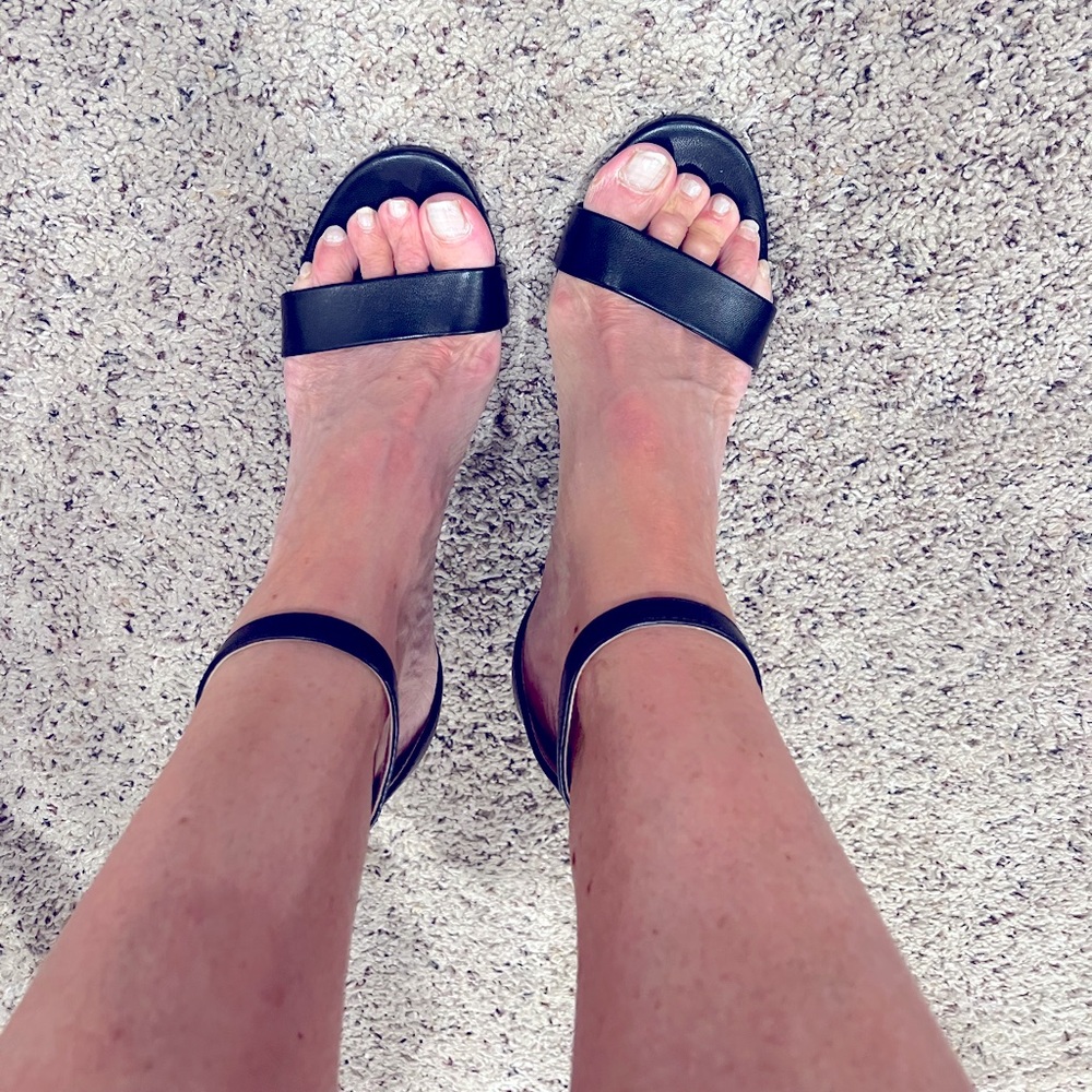 Black, high heeled sandals with ankle strap